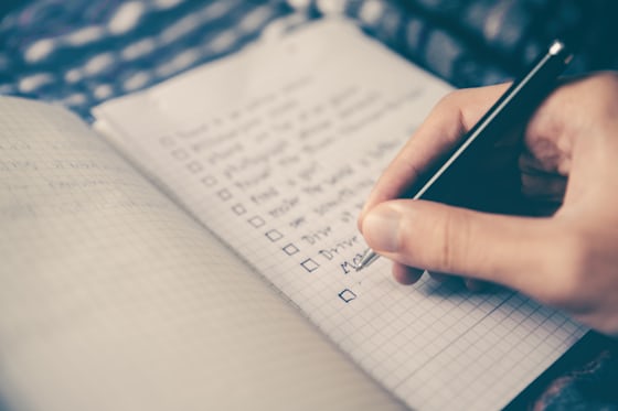 Notebook with a meal plan and checklist